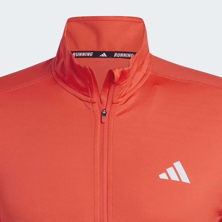 Orange Own the Run 1/4 Zip Long Sleeve sweatshirt