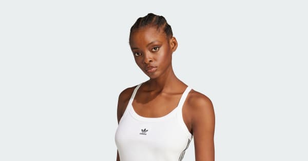 あ*ら様 黒と白のストライプ タンクトップ adidas（アディダス）の「アディカラー クラシックス スリーストライプ