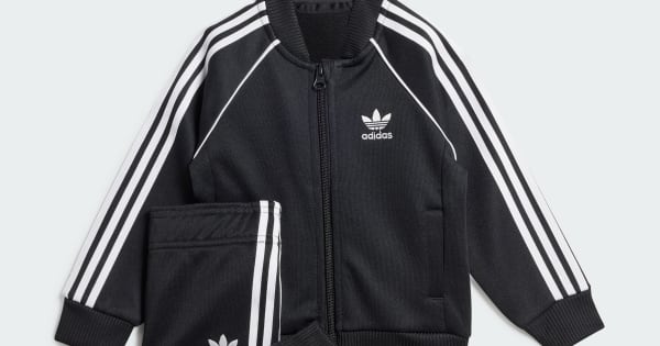 adidas ブラック ジャージジャケット（ミッキー） adidas（アディダス）の「adidas × Disney ミッキーマウス トラック
