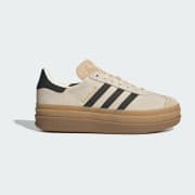 Couleur du produit : Cream White / Core Black / Sand Strata