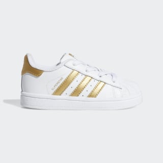 adidas with gold stripes