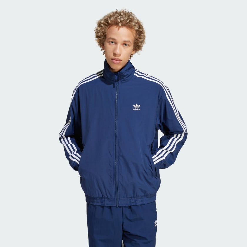 adidas Firebird track top in blue - ShopStyle Activewear Jackets