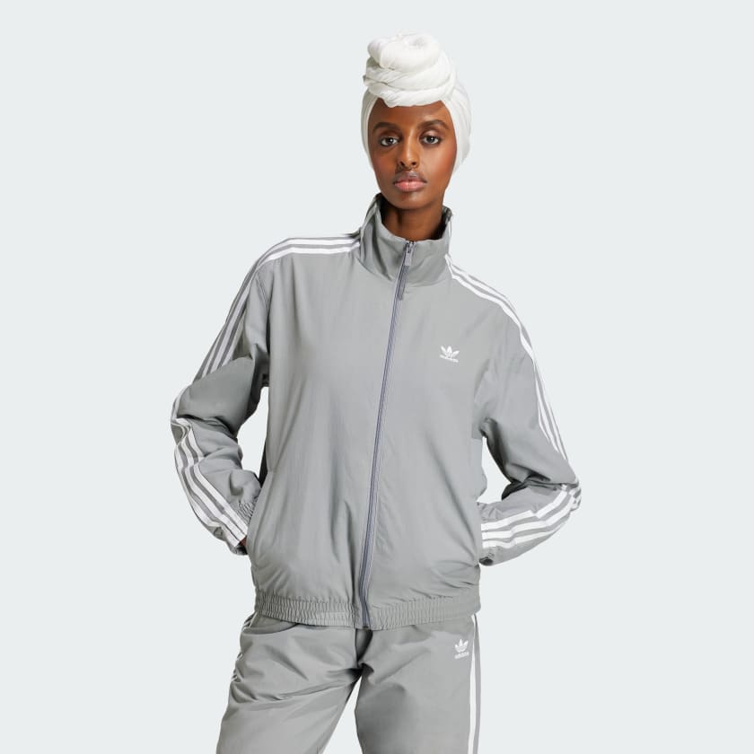 Adidas woven track top store