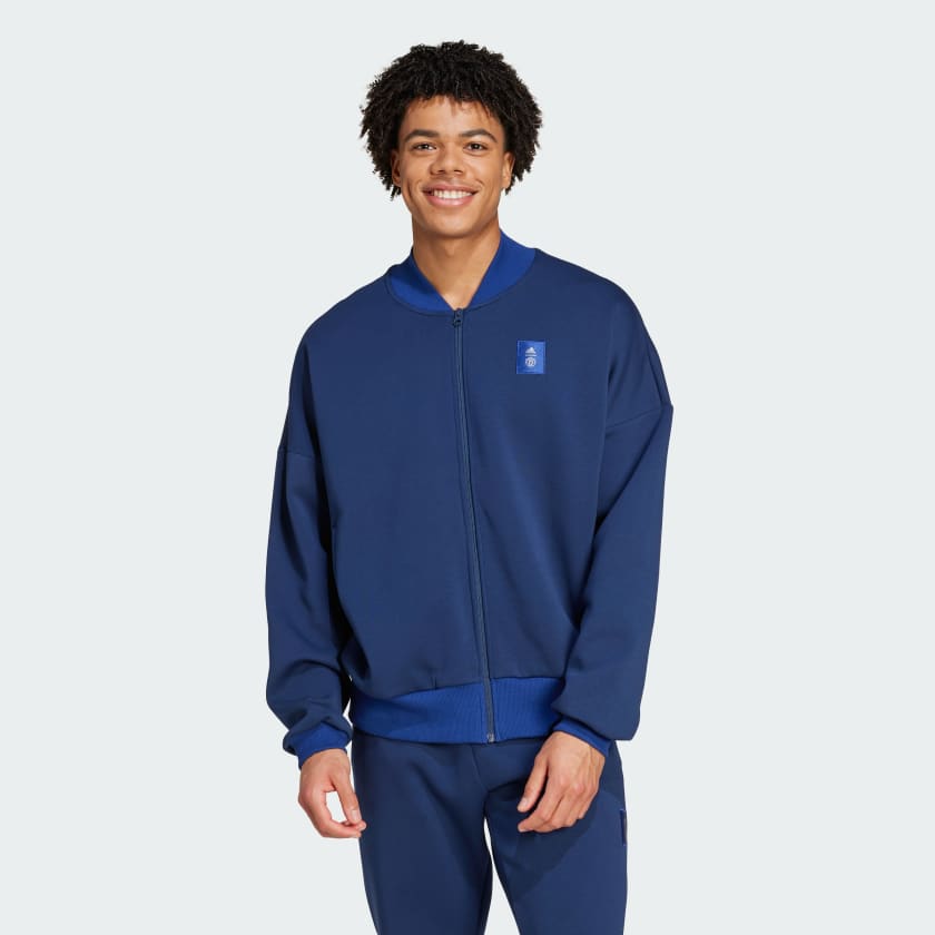 Man united blue tracksuit sales