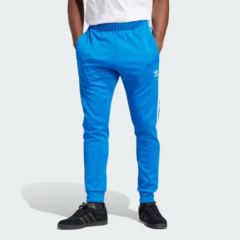 adidas SST Track Pants - Blue | adidas US | Sport pants, Adidas street  style, Track suit men