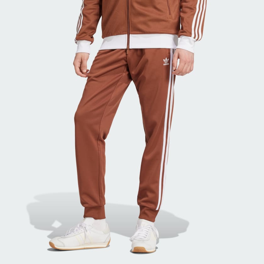 Adidas track pants with zipper pockets shop
