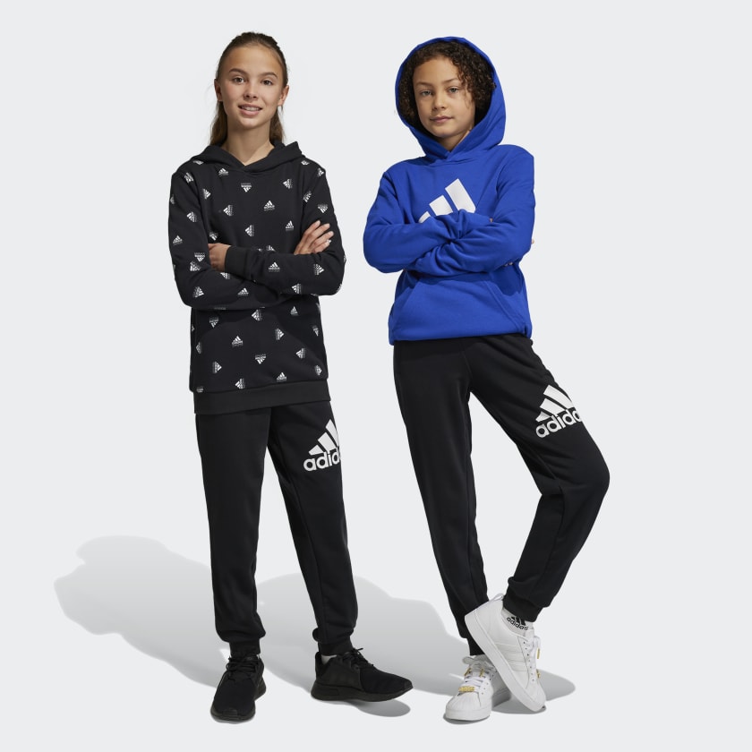 adidas Essentials Pantalon large en tissu éponge 3 bandes pour femme :  : Mode