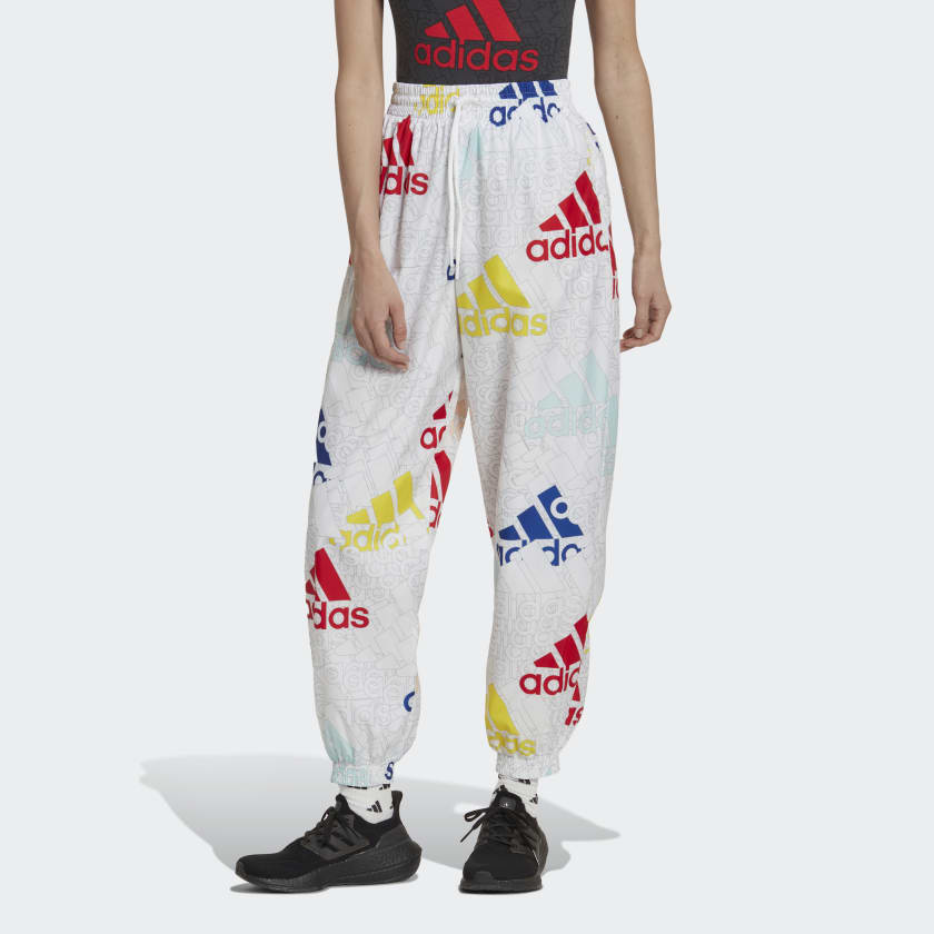 adidas Essentials Multi-Colored Logo Loose Fit Woven Pants - White | Women's | adidas US