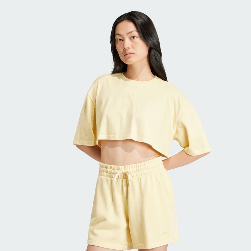 アディダス エッセンシャルズ+ クロップドTシャツ - イエロー