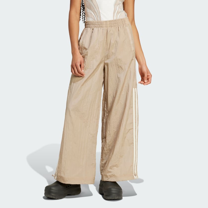Beige adidas track pants sales
