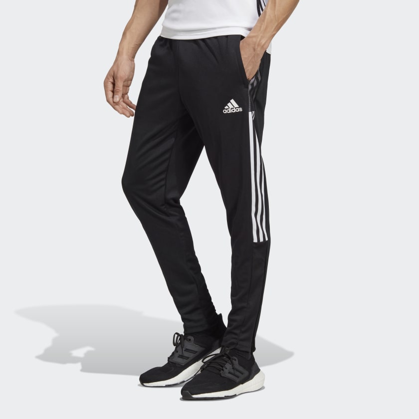 Le pantalon survêtement accent filet Tiro noir, Adidas