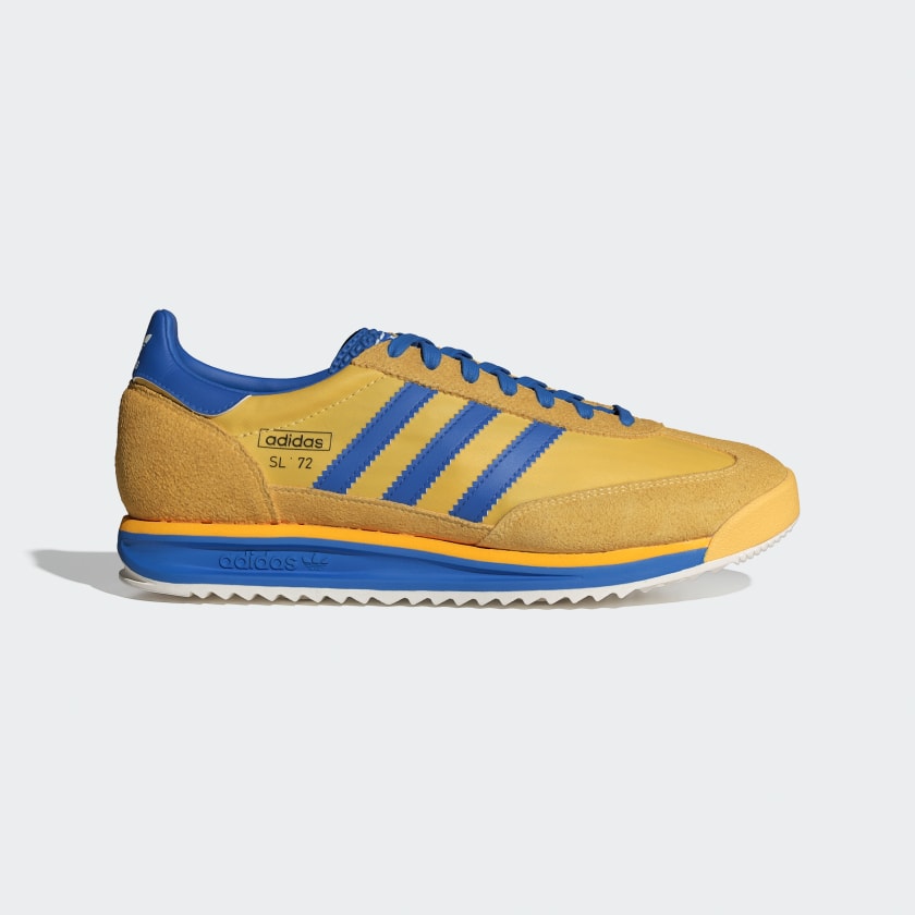 Adidas Originals SL 72 RS trainers in yellow and blue. 