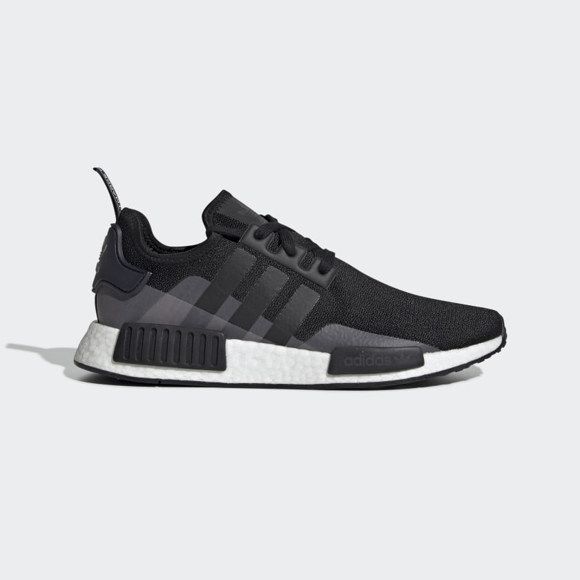 white nmds with black stripes