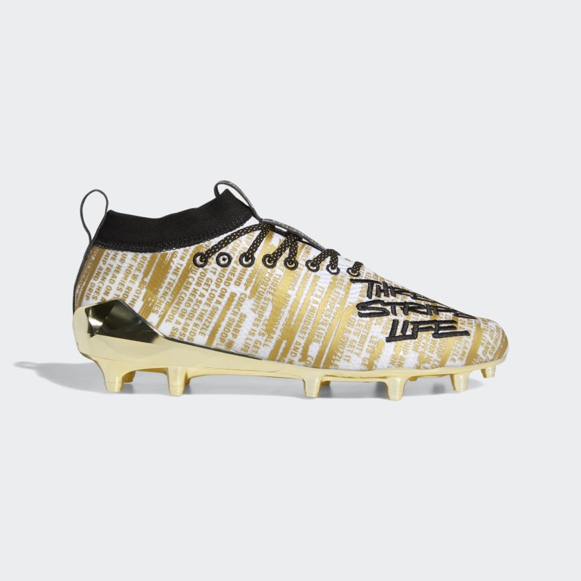 adidas gold and black cleats