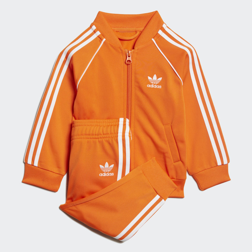 adidas originals three stripe track jacket in orange