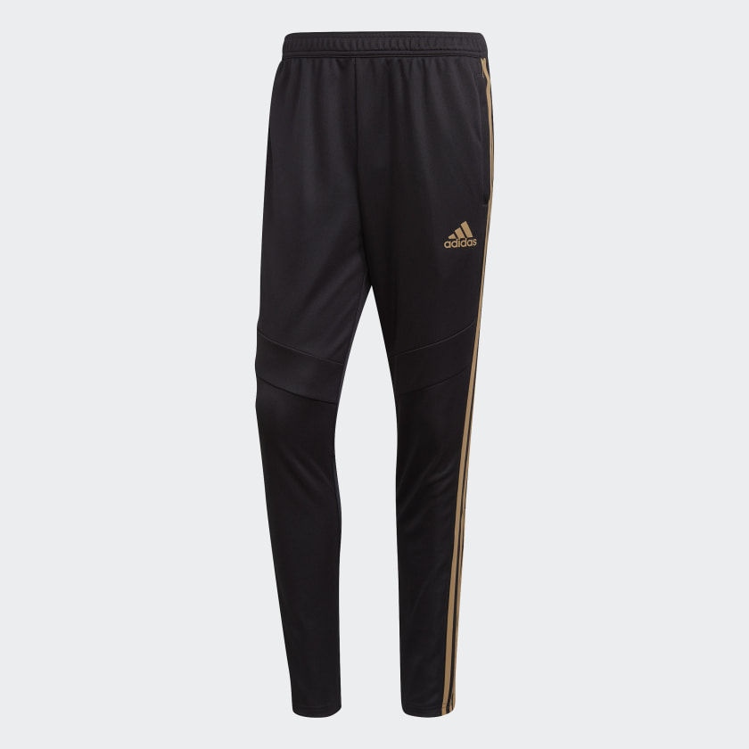 gold and white adidas pants
