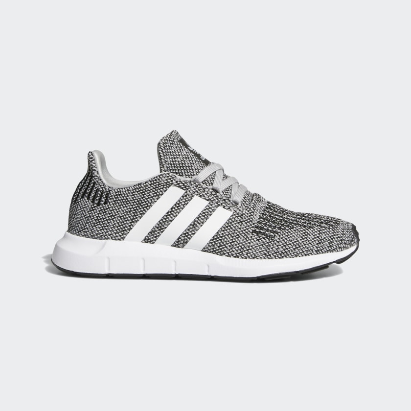 grey and white adidas swift run