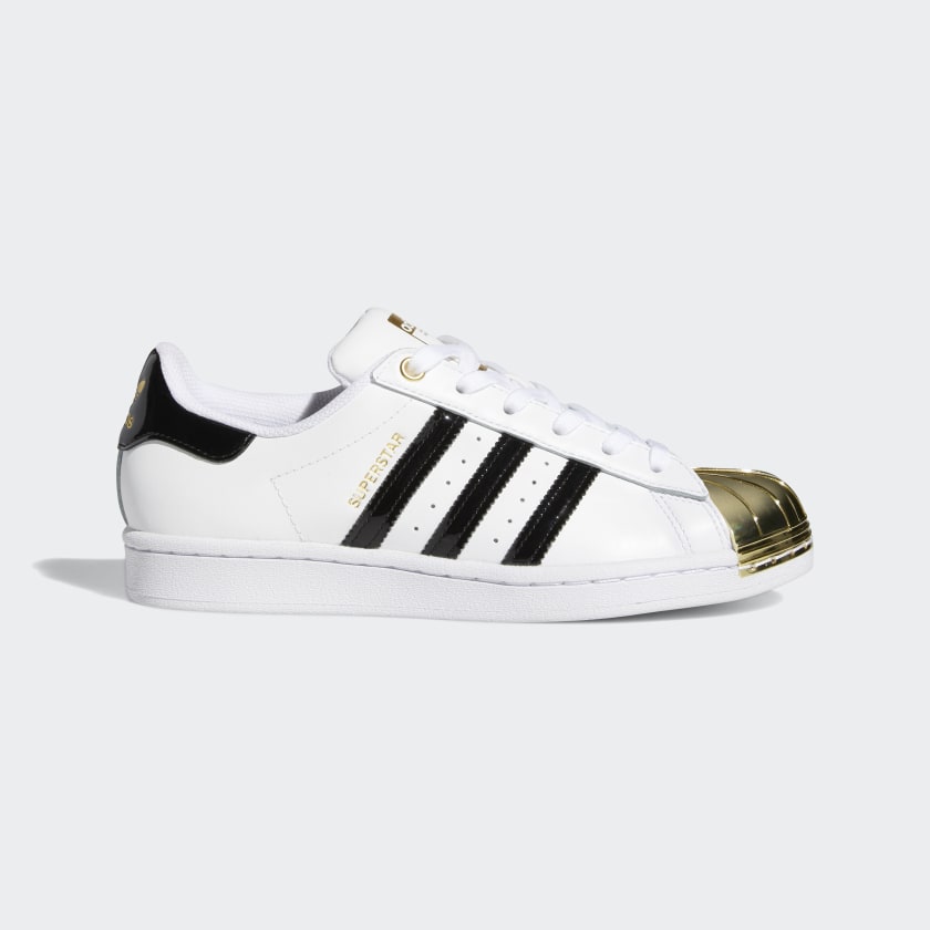 white adidas with gold