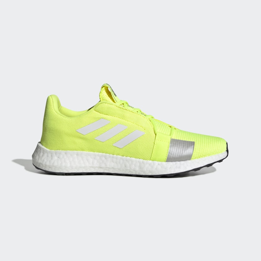 yellow running sneakers