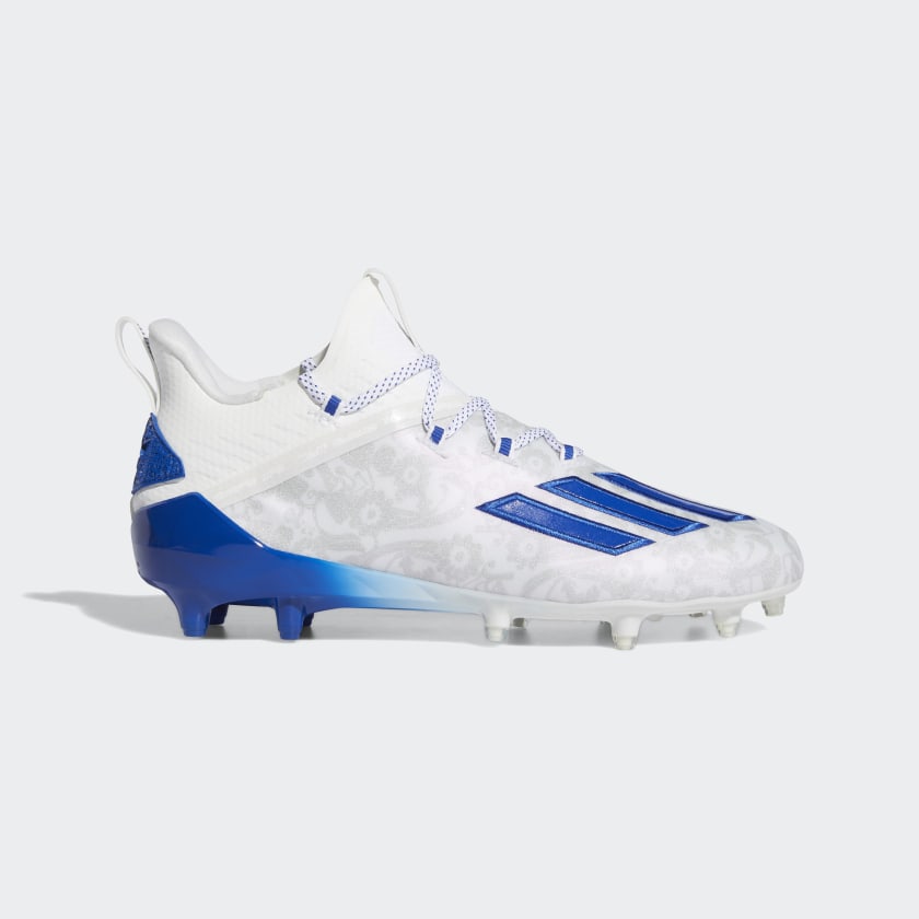 white and blue football cleats