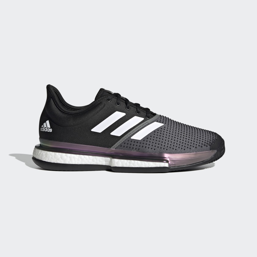 black tennis shoes with black soles