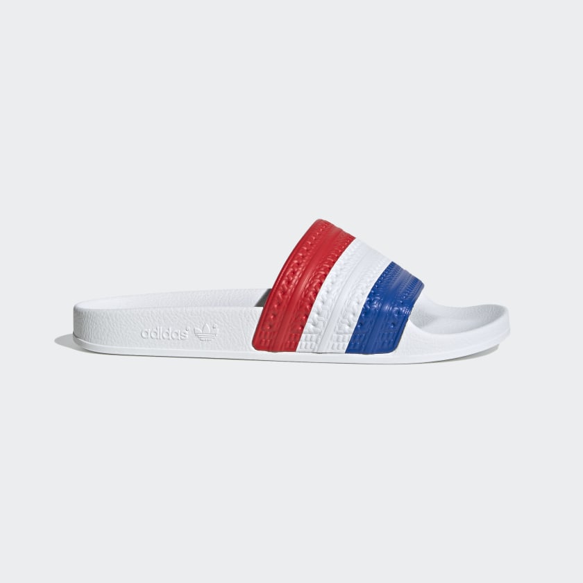 white and red adidas slides