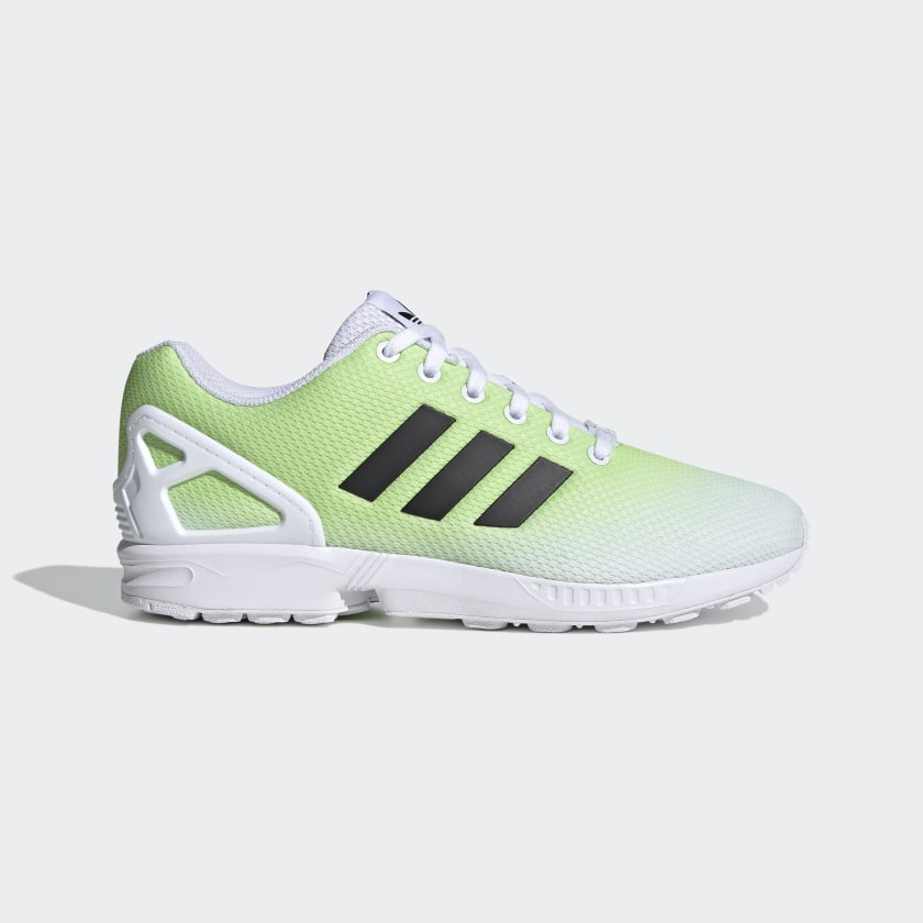 white adidas flux trainers