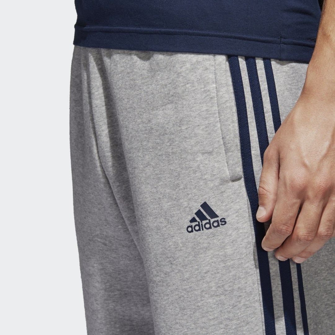 фото Флисовые брюки-джоггеры essentials 3-stripes adidas performance