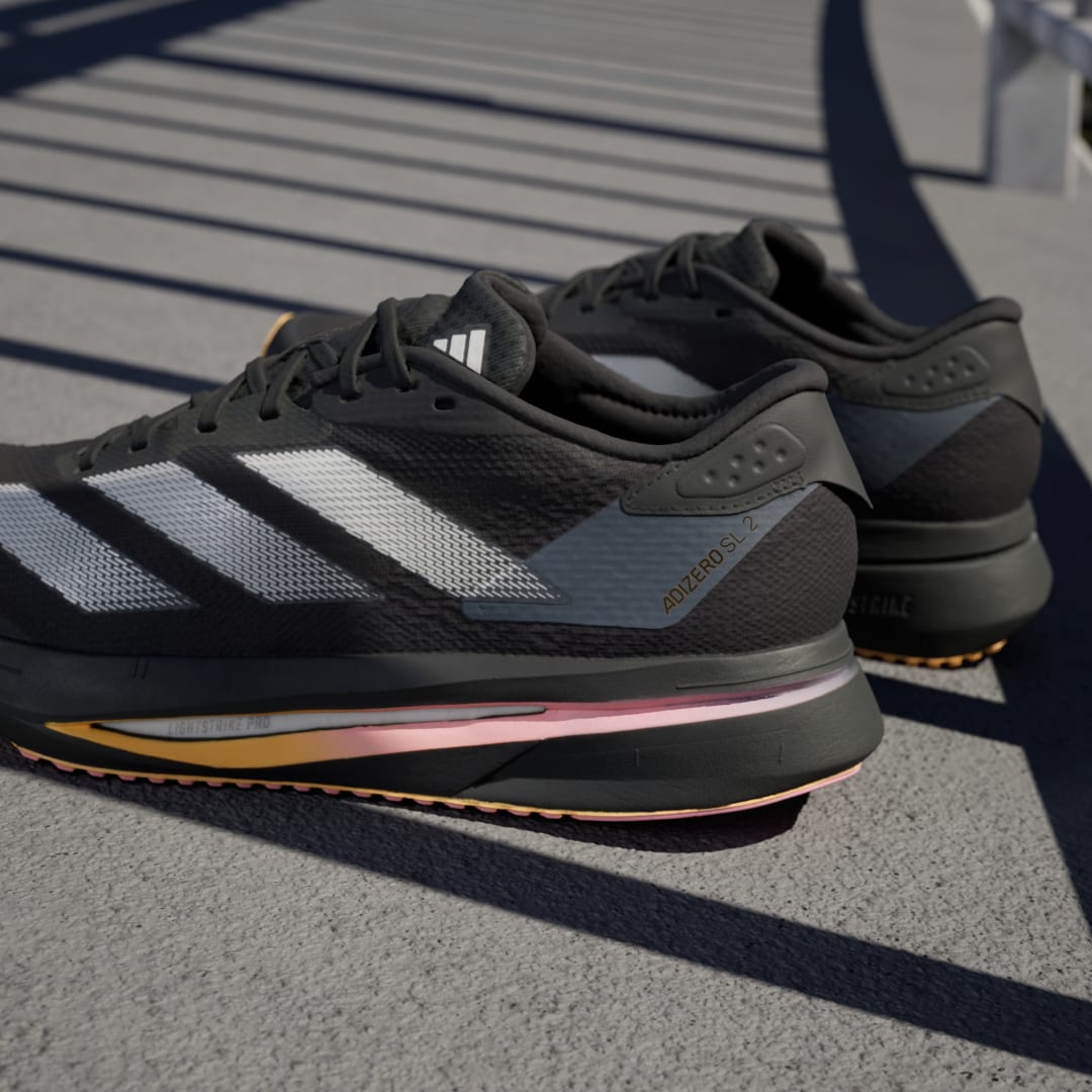 

adidas Tenis de Running Adizero SL2 Mujer, Negro/zero metalic/spark