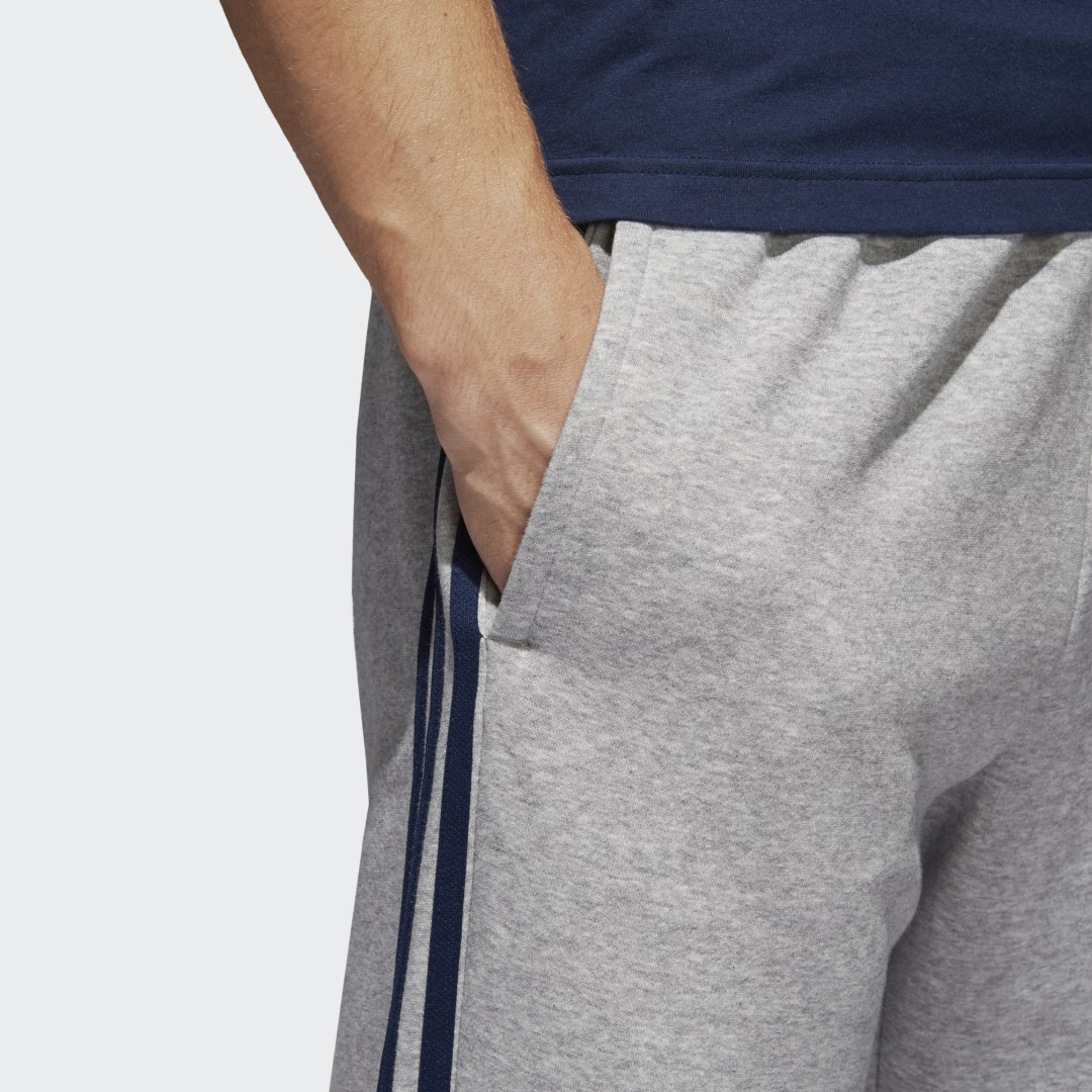 фото Флисовые брюки-джоггеры essentials 3-stripes adidas performance