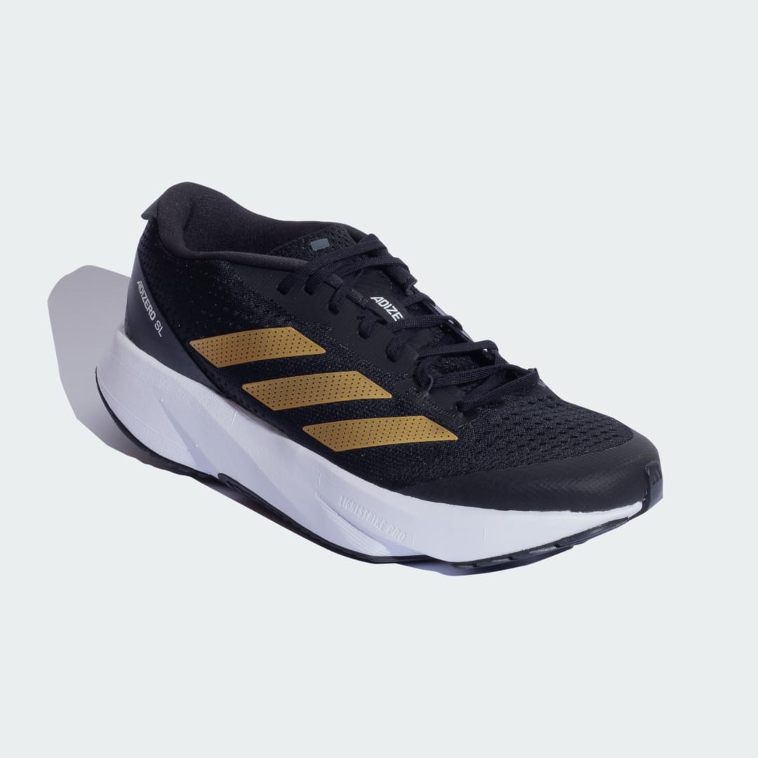 

adidas Tenis Adizero SL Cierra Unisex, Negro/oro gris/carbon