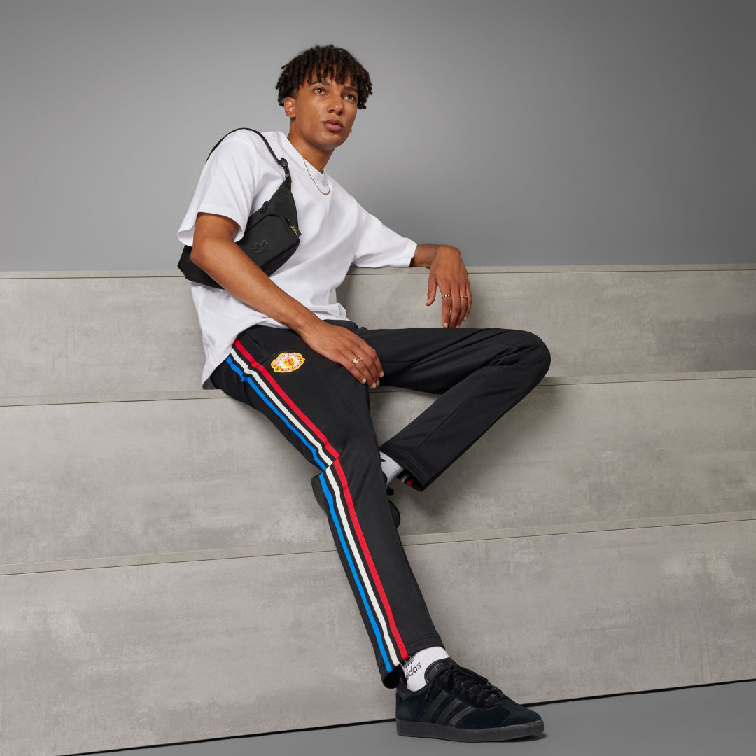 

adidas Pantalón Manchester United Stone Roses Originals Hombre, Negro