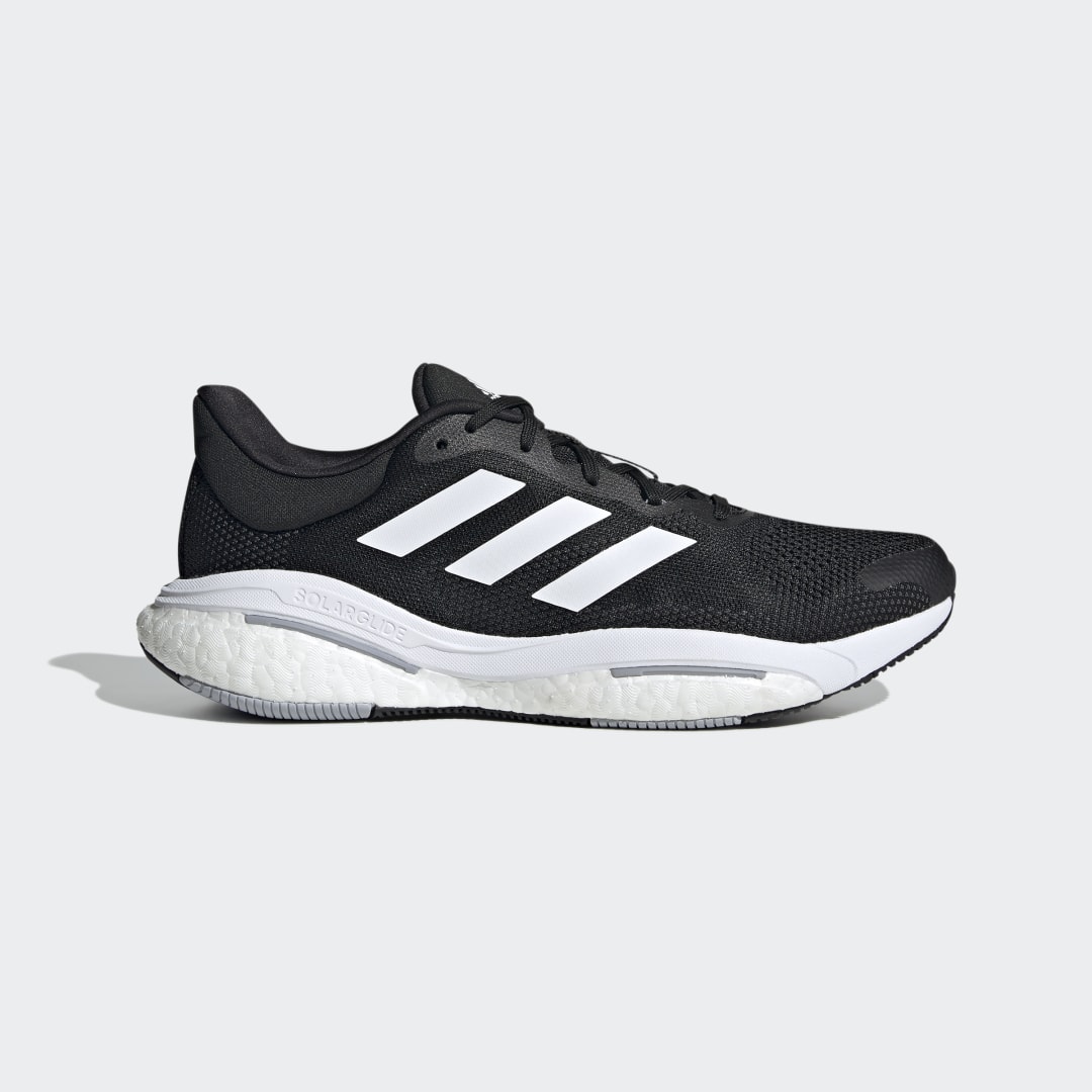 Foto van zijkant van de loopschoen Adidas Solarglide 5