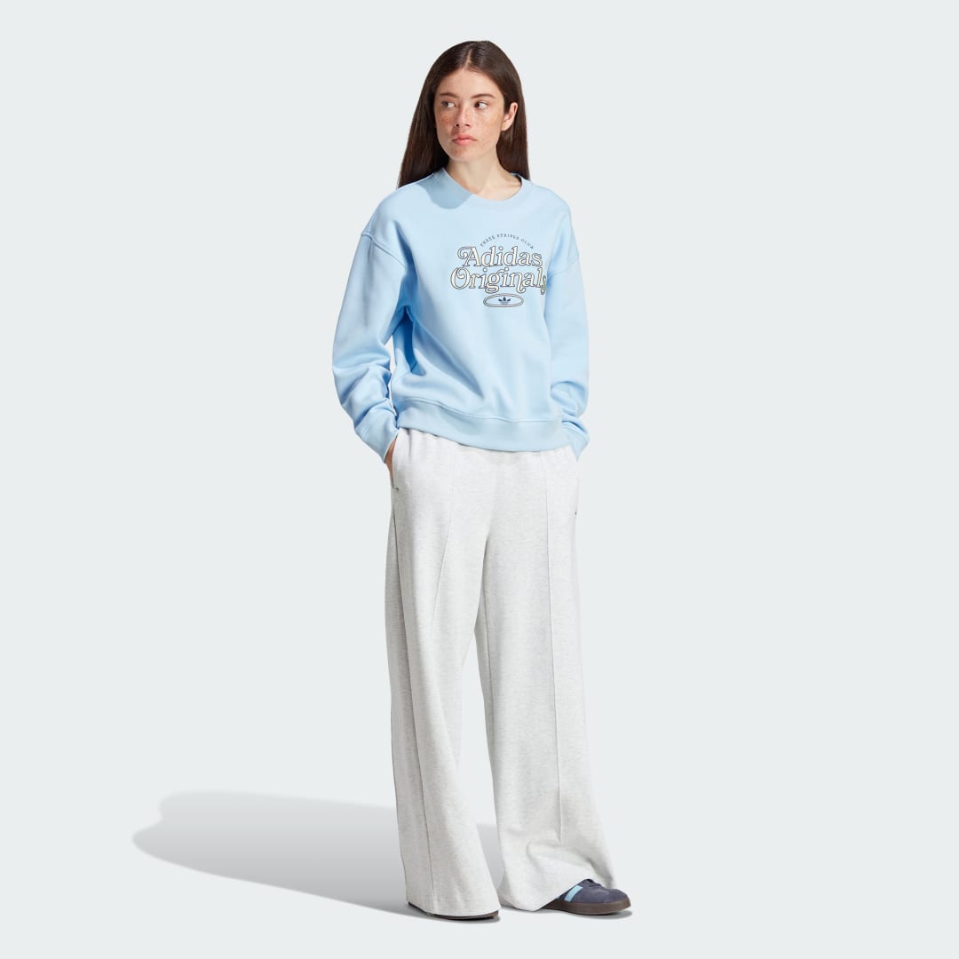 

adidas Buzo Graphics Mujer