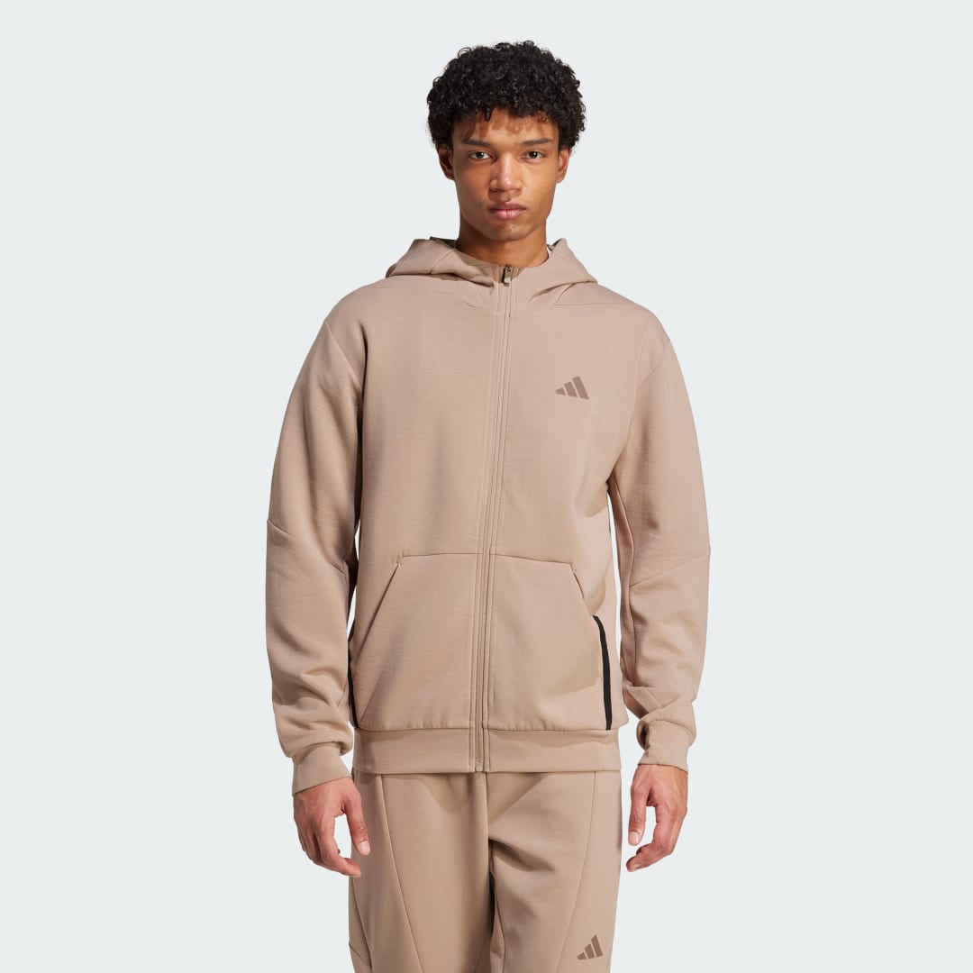 Veste de survêtement entièrement zippée conçue pour 'entraînement