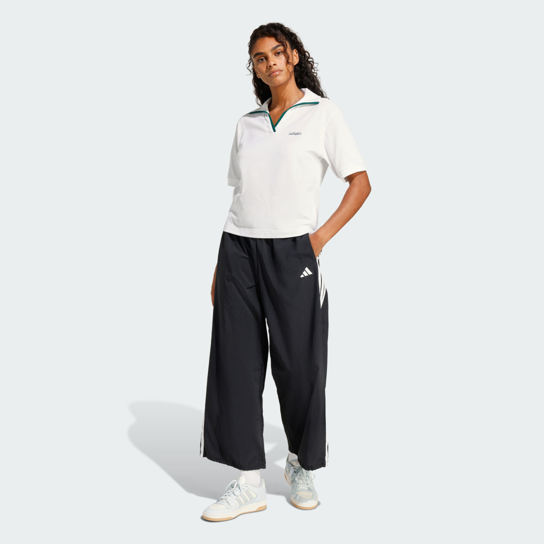 Thumbnail - Seasonal Essentials Colorpop Poloshirt mit aufgestickter Grafik