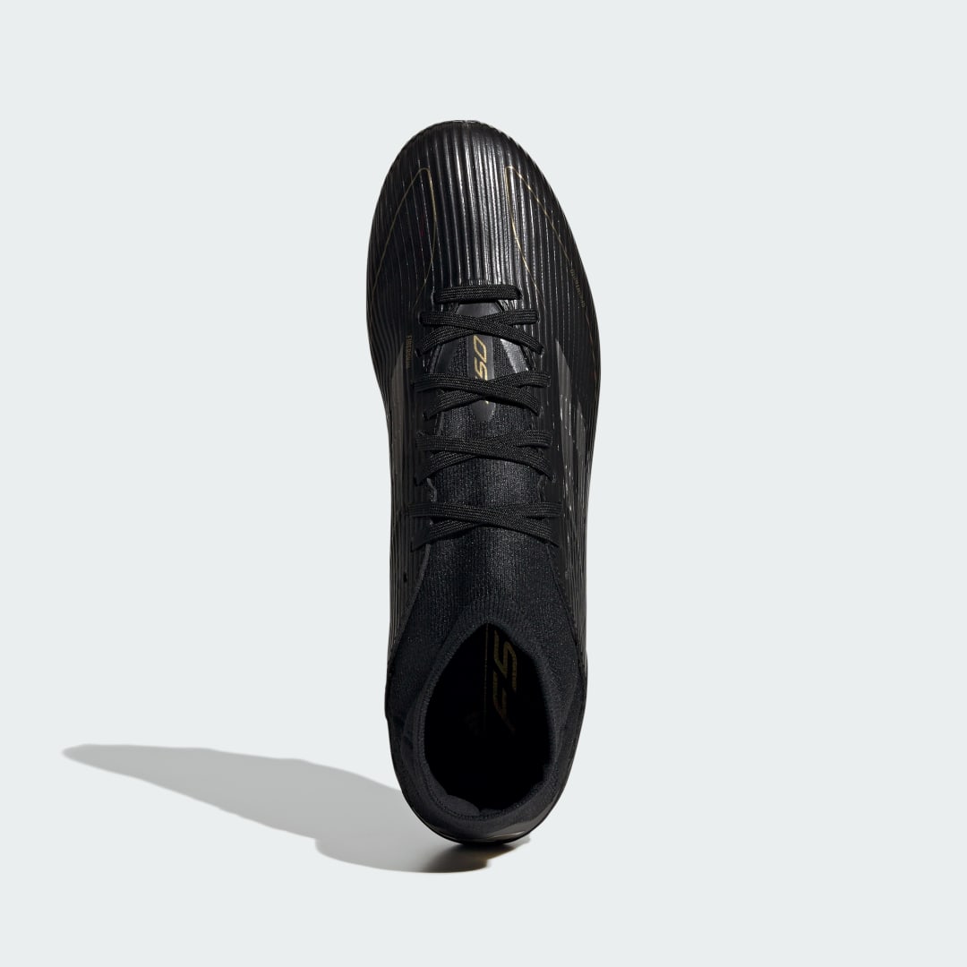 Chaussure F50 League mi-montante terrain souple / multi-surfaces