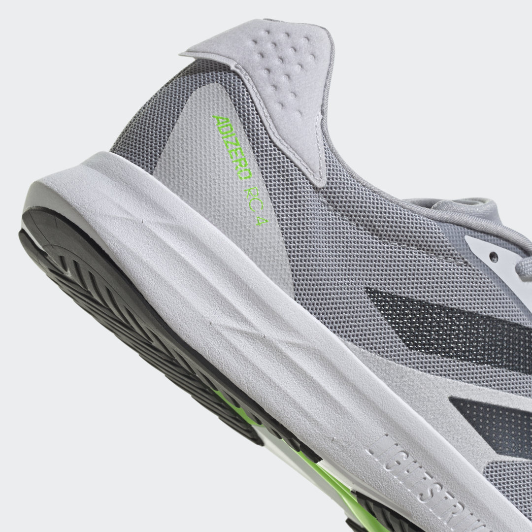 

adidas Tenis Adizero RC 4 Unisex, Halo plata/negro/dash gris