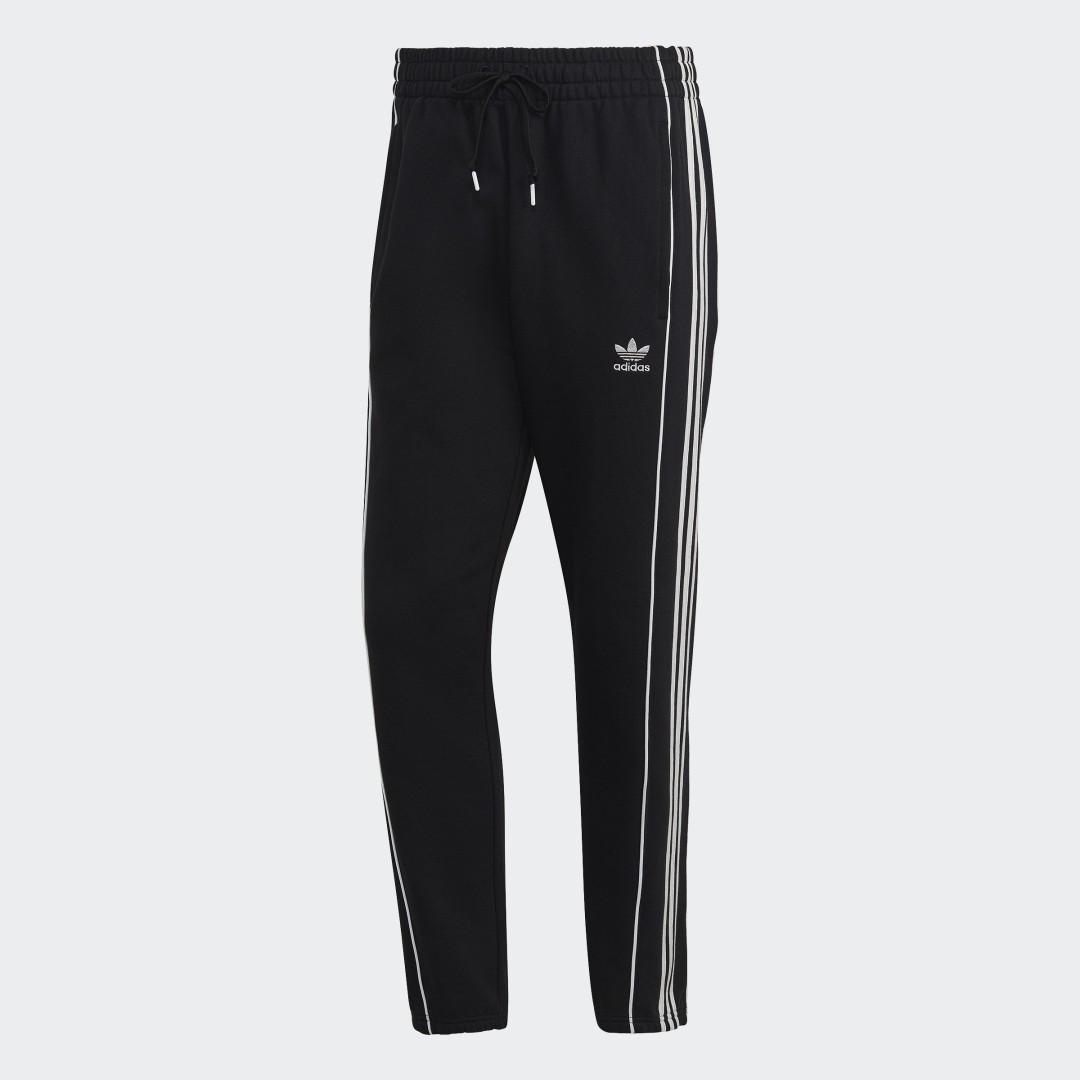 Pantalon de survêtement adidas Rekive
