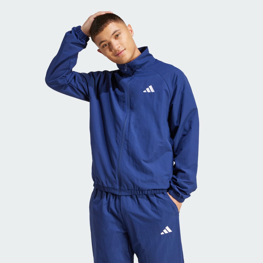 Image of Giacca a vento essenziale con logo piccolo cod002