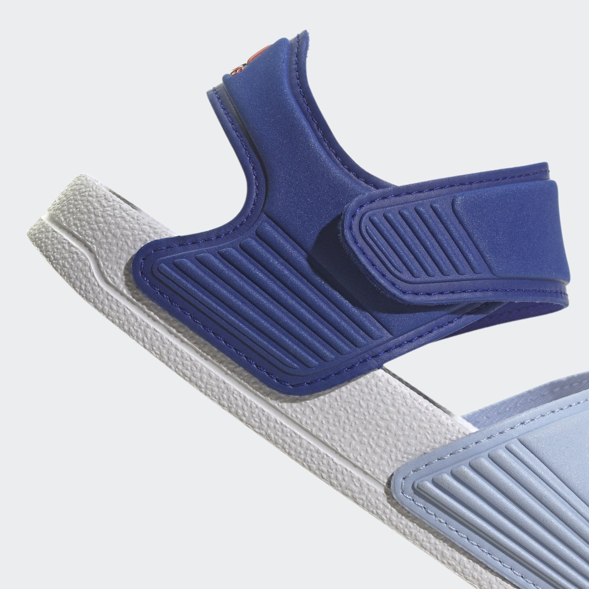 Adidas Adilette Sandals. 10