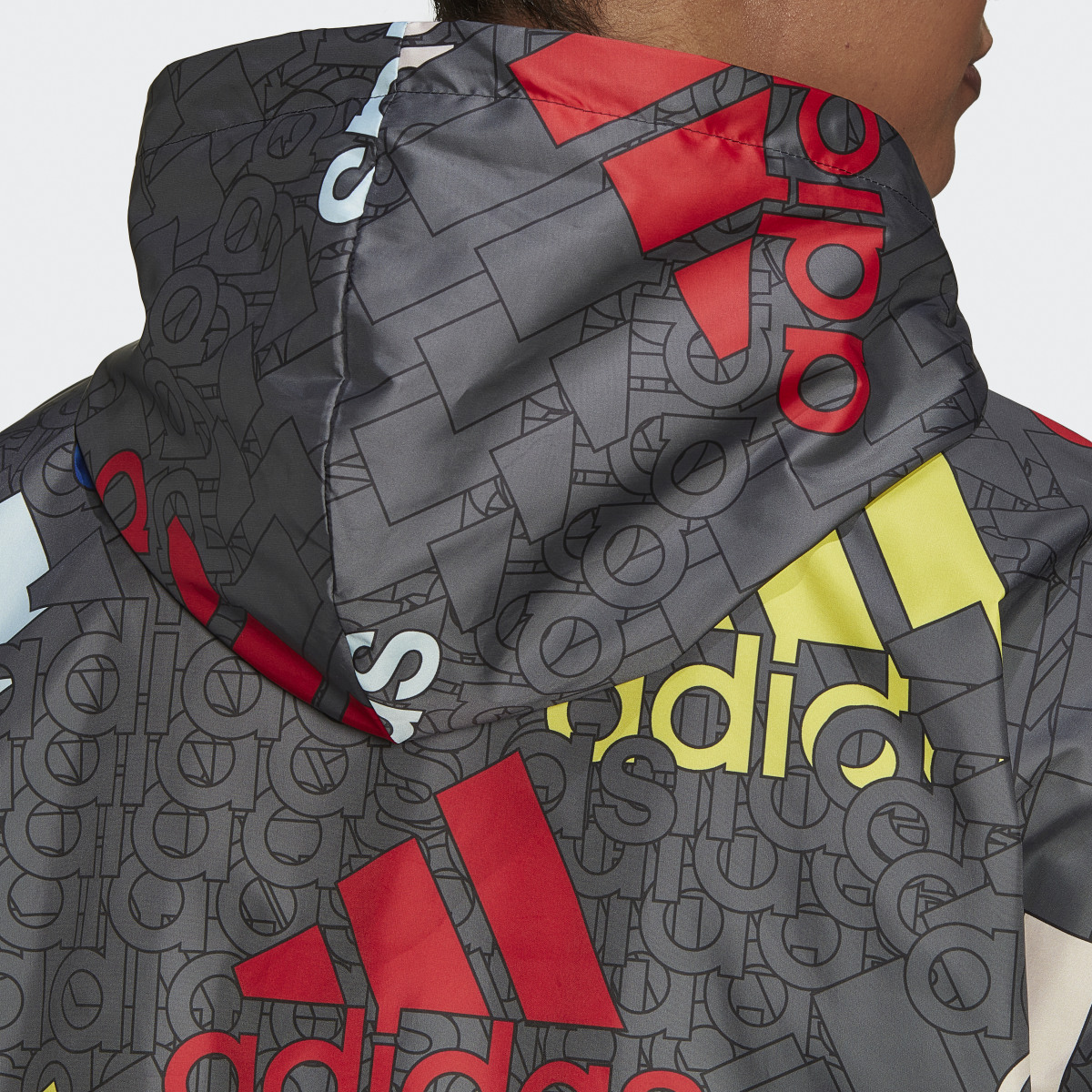 Adidas Essentials Multi-Colored Logo Loose Fit Windbreaker. 10