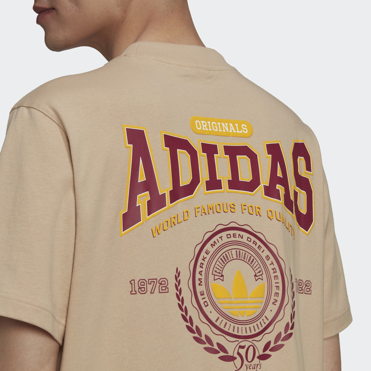 Adidas Varsity Loose Tee. 7