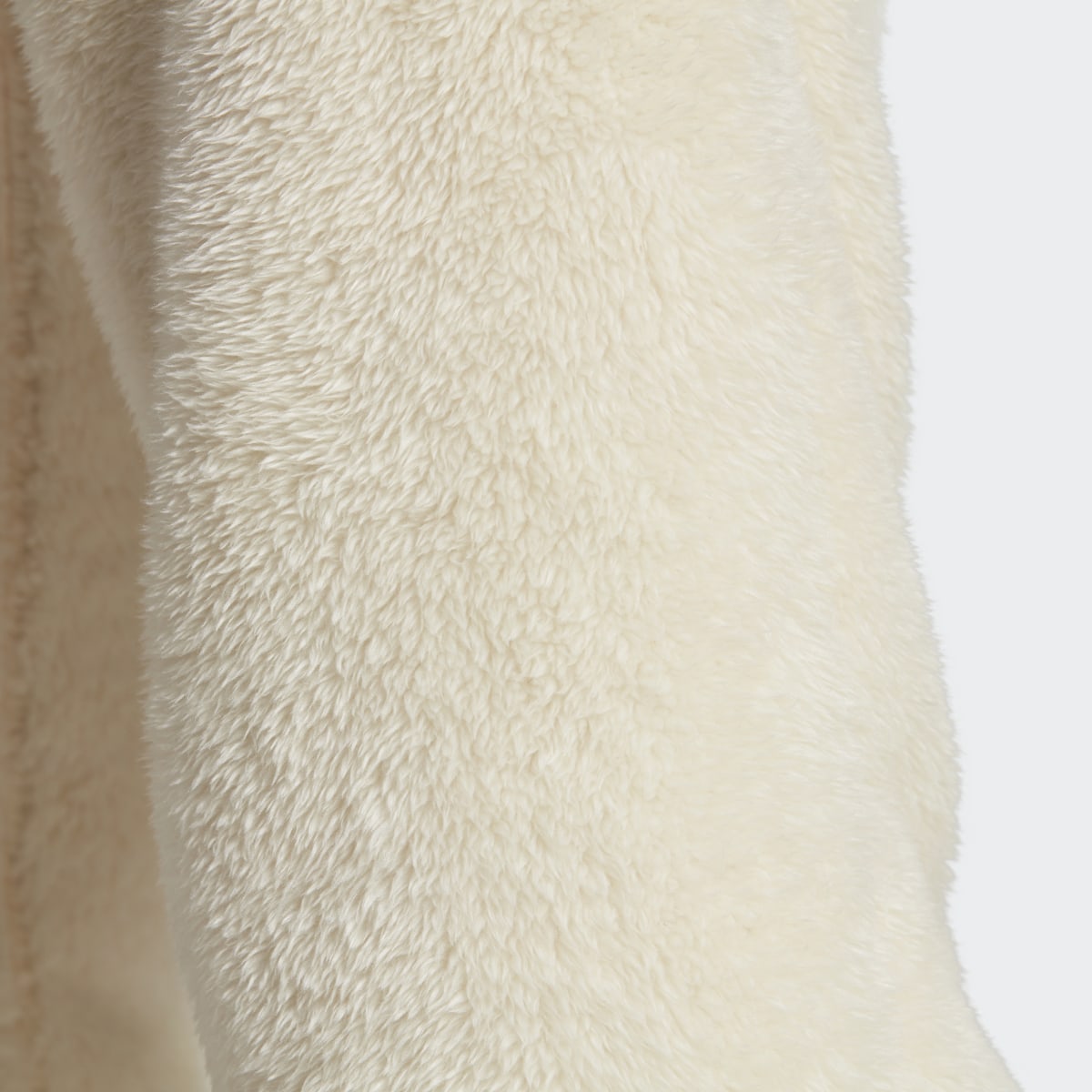 Adidas Essentials+ Fluffy Fleece Joggers. 7