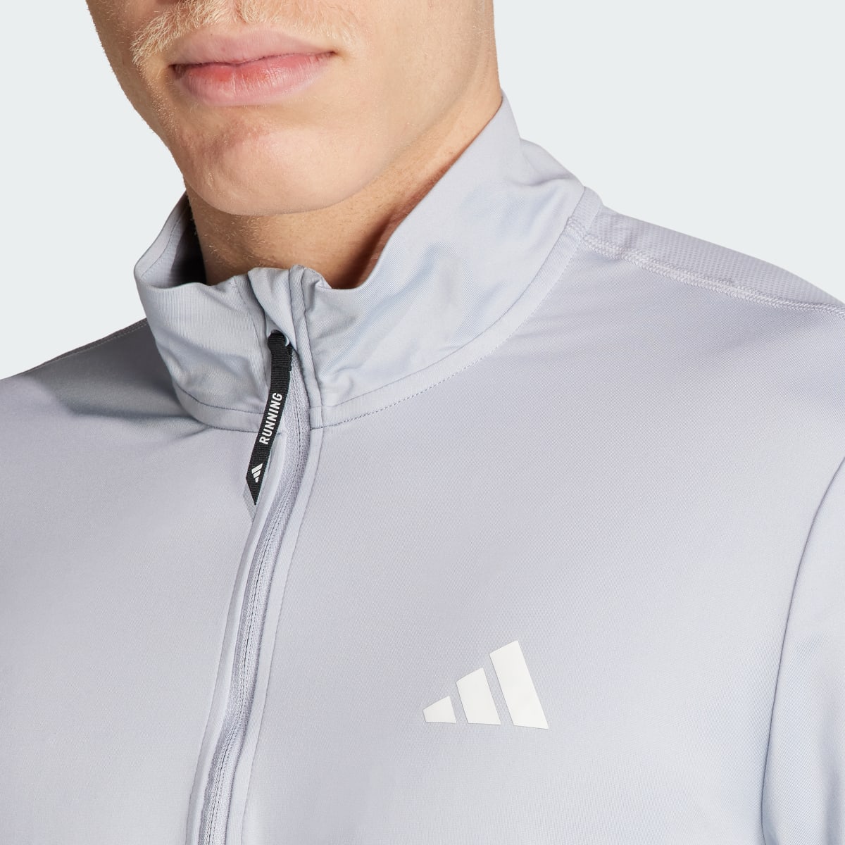 Adidas Own the Run Half-Zip Jacke. 6