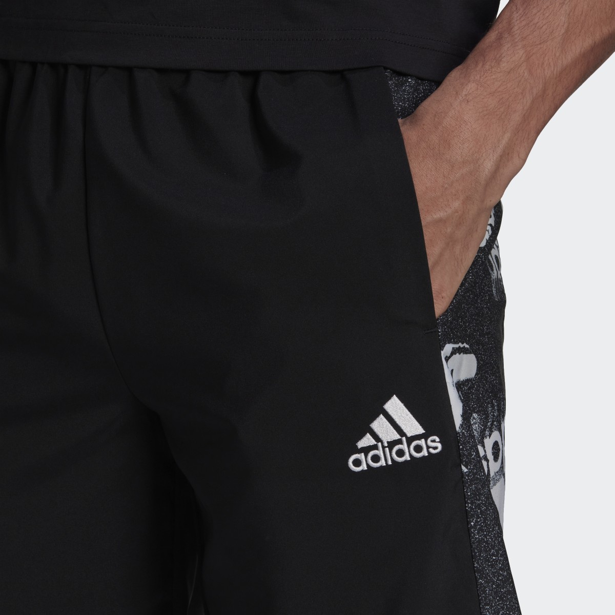 Adidas Essentials BrandLove Woven Shorts. 5