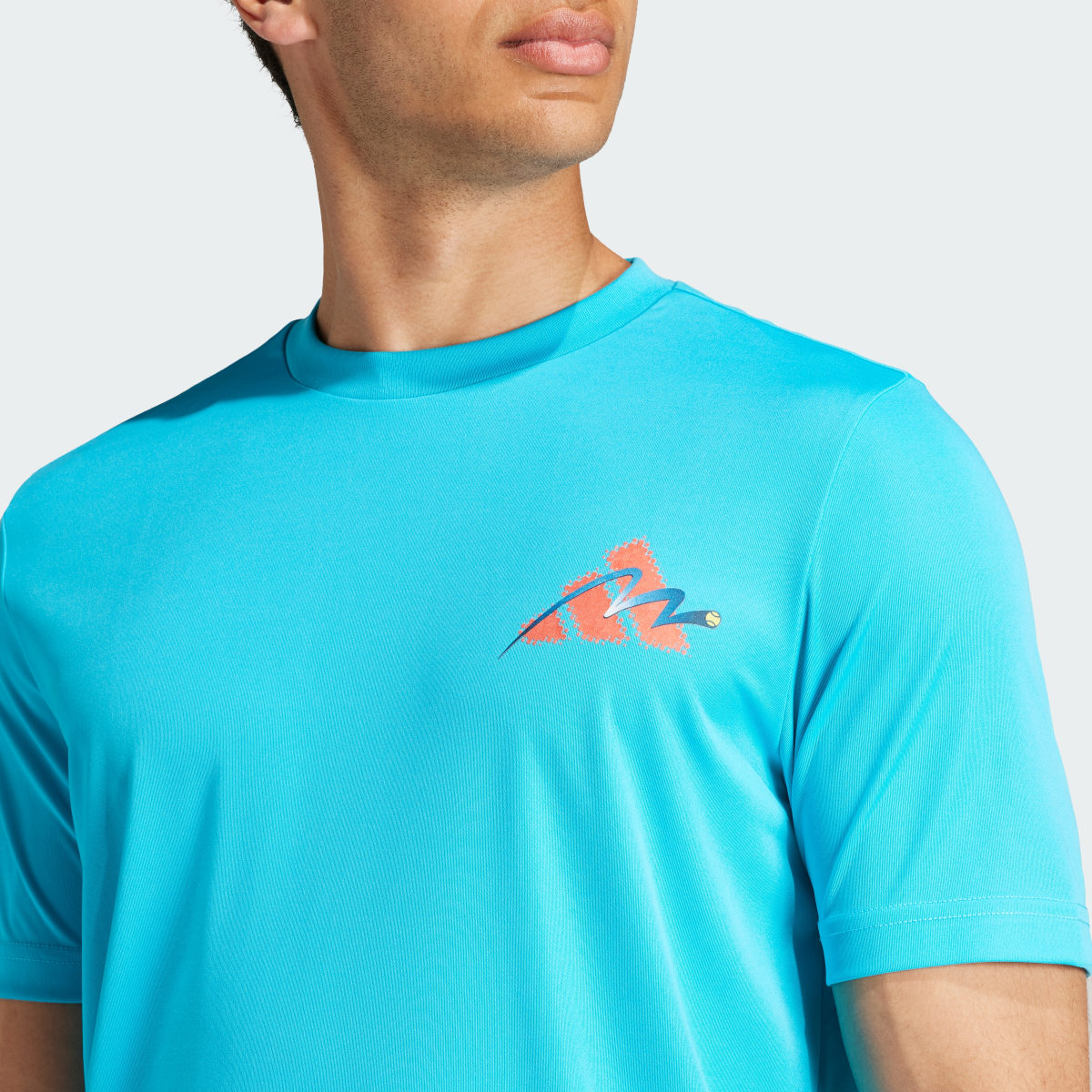 Adidas Playera Court Sport Graphic. 6