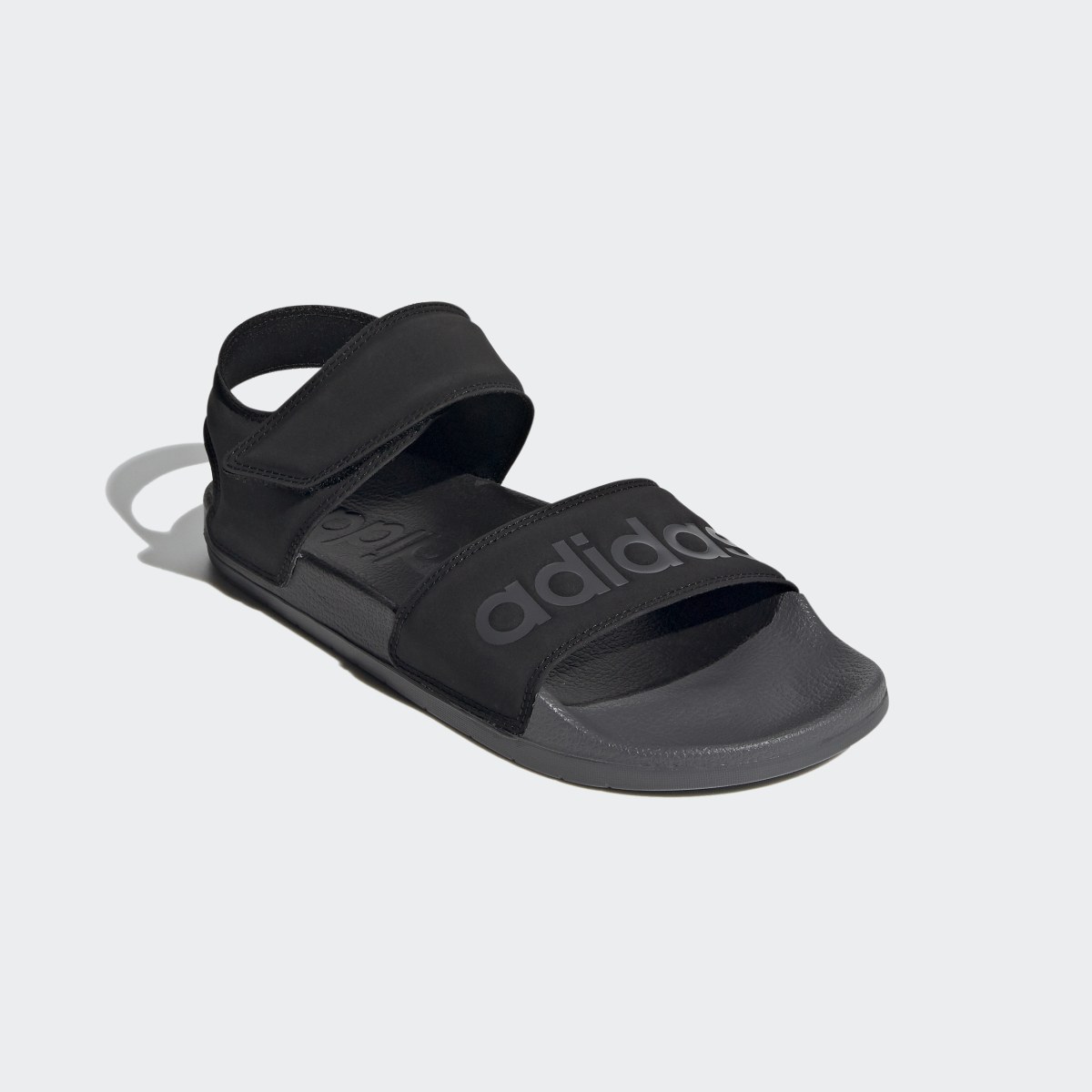 Adidas Adilette Sandals. 5