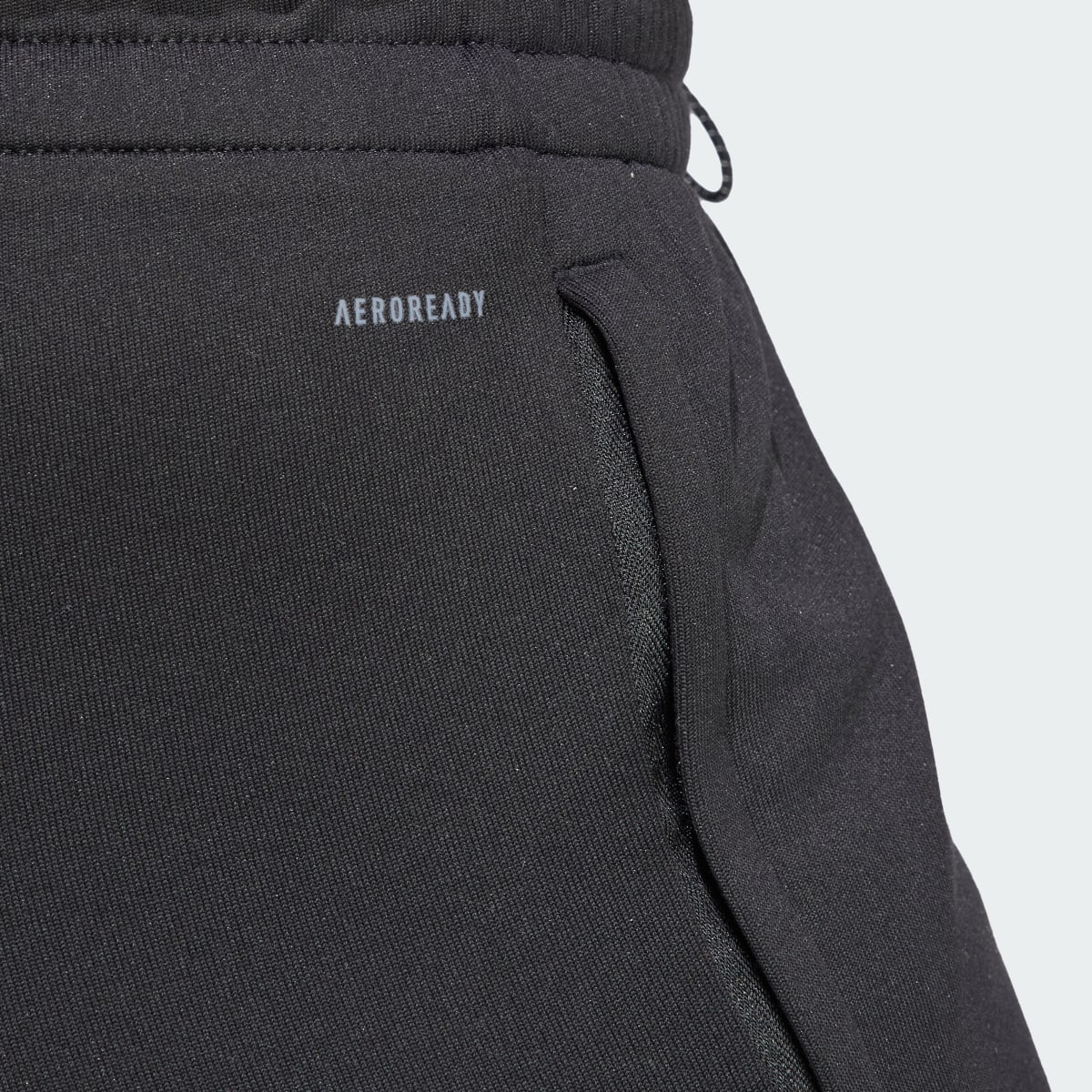 Adidas Pantalón AEROREADY Game and Go Regular Tapered Fleece. 7