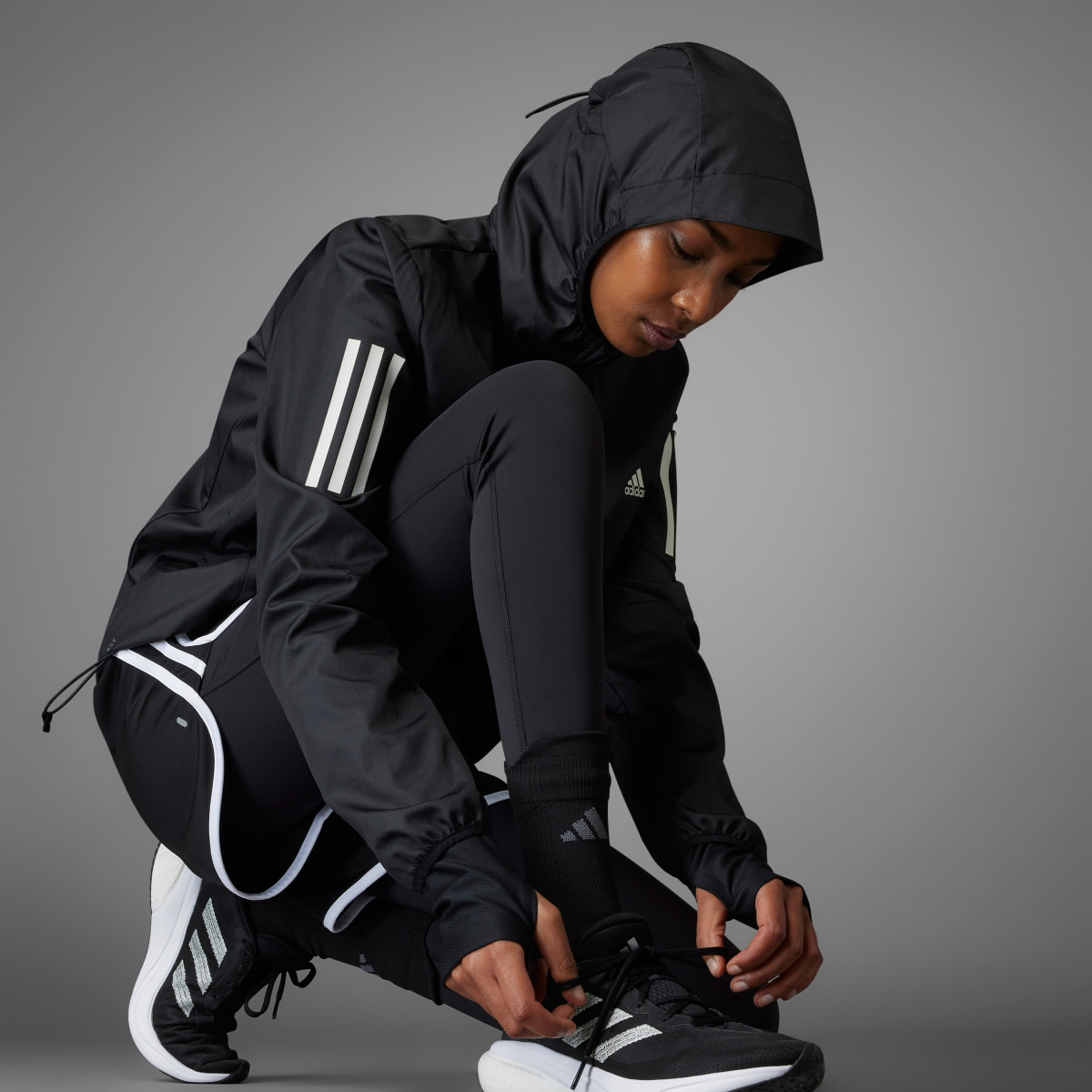 Adidas Own the Run Hooded Running Windbreaker. 6